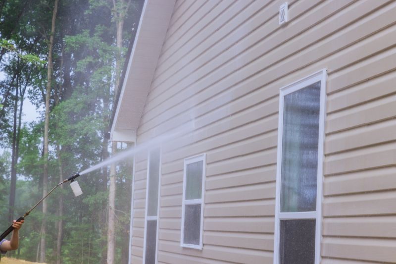 Cleaning the completed siding